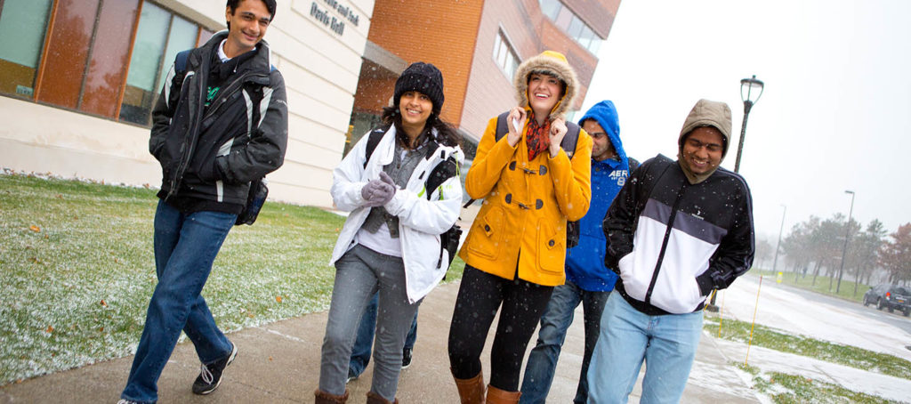 Students walking outside in the winter